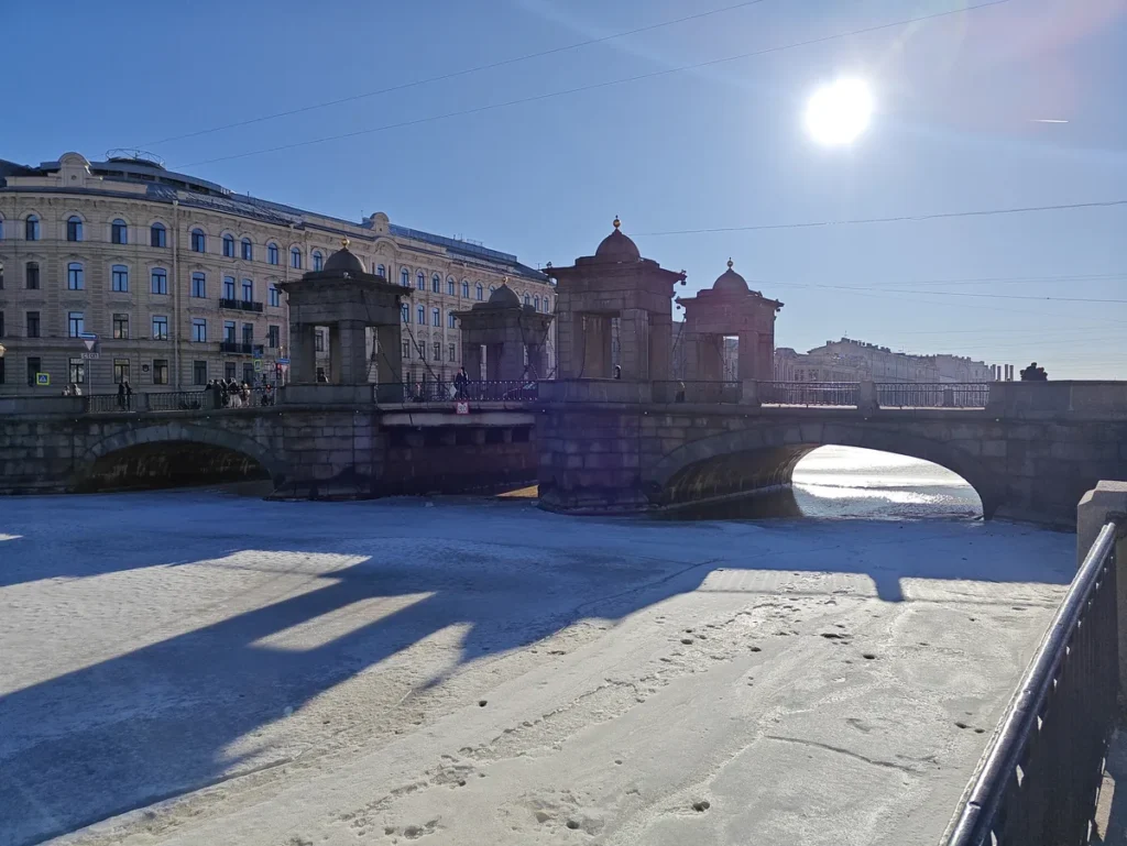 Ornate historic bridge over the Fontanka canal in Saint Petersburg, Russia